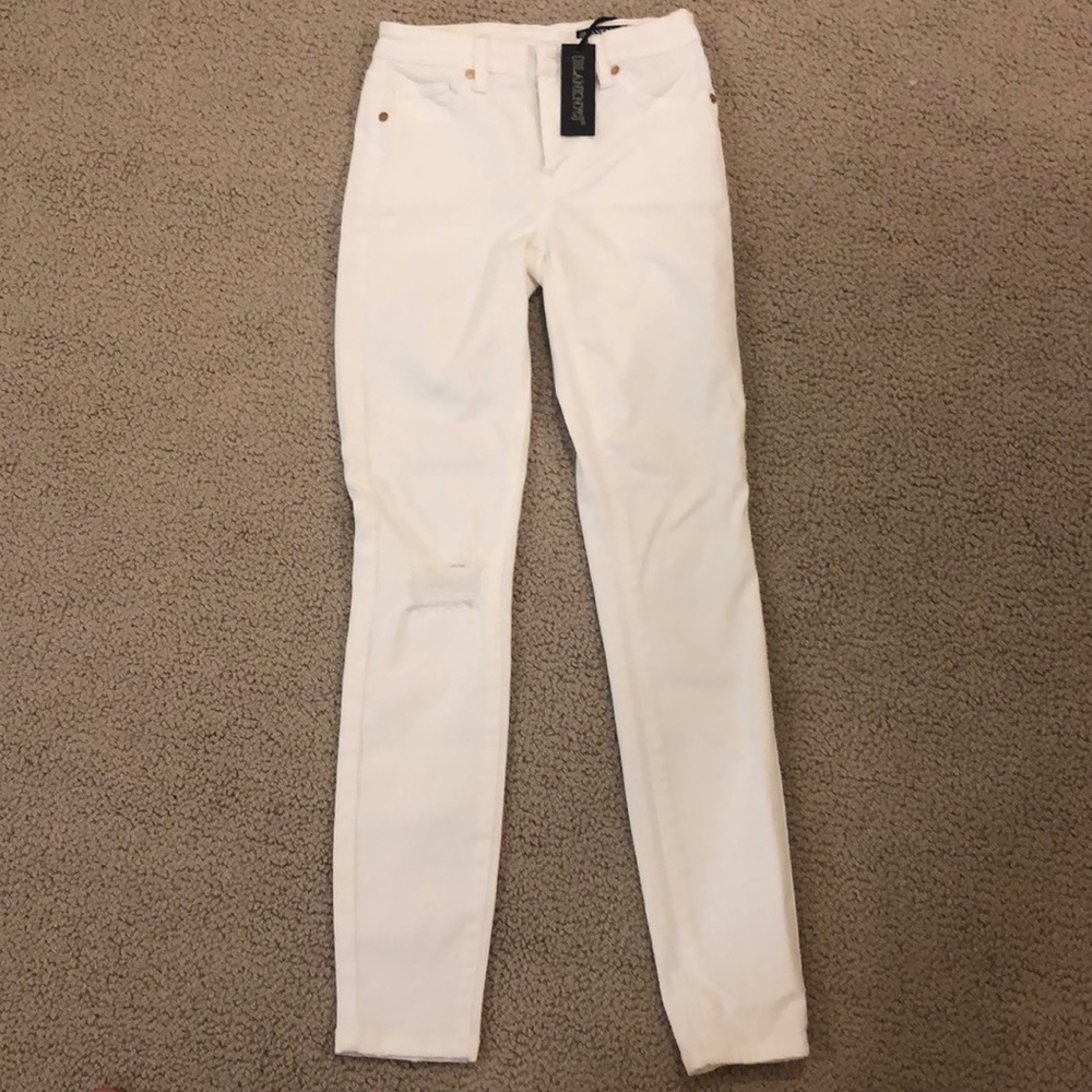 Size 24 mid rise skinny jeans